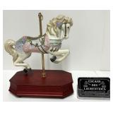Cheval en porcelaine sur boï¿½te musicale,