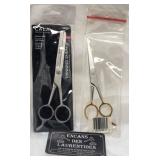 2 ciseaux de coiffure, dont Cala Professional