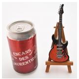 Briquet en forme de guitare électrique, avec