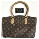 Sac ï¿½ main, ï¿½tat presque neuf