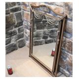 Miroir dans cadre en métal, le cadre mesure