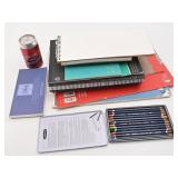 Crayons d'aquarelle et blocs de papier