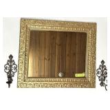 Miroir antique et chandeliers en laiton