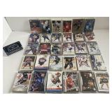 Environ 600 cartes de hockey