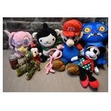 Lot de peluches, dont Stitch et Mario Bros.