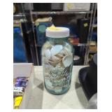 Ball canning jar full of seashells number 8 half