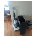 Laundry basket and Amazon basics vacuum