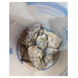 Bucket of various rocks minerals