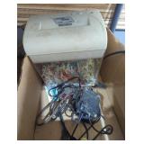 Paper shredder and a fish blower