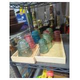 Lot of nine telephone insulators some painted