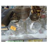 Two oil lamps lanterns one hurricane