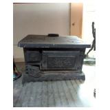 Dainty Cast iron toy cook stove needs repair