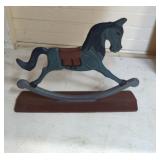 Cast iron mounted rocking horse door stop