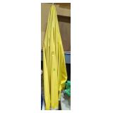 Vintage vinyl umbrella patio use appears to be in
