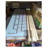 Vintage metal display shelf with hangers
