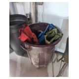 Trashcan with three camp folding chairs