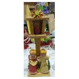 Vintage Christmas decorations caroling under a