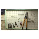 Pegboard contents, outdoor lawn and garden tools