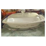 Vintage Pyrex casserole with metal stand