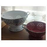 Two modern strainers enamelware