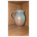 Signed pottery water pitcher 8'