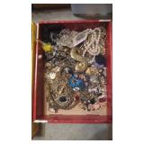 Flat of vintage costume jewelry