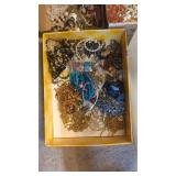 Flat of vintage costume jewelry