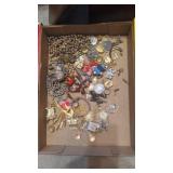 Flat of vintage costume jewelry