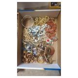 Flat of vintage costume jewelry