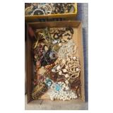 Flat of vintage costume jewelry