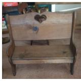Child or garden bench with heart cut out all