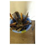 Tub of paint scrapers glue applicators trowels