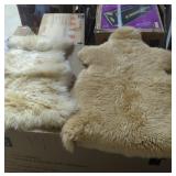 Two sheep skin hides