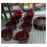 Ruby red glass cups and saucers lot of eight