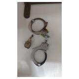 Handcuffs with key and small charm