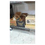 Shelf lot of vintage advertising boxes. The