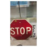 Street stop sign and advertising for real estate