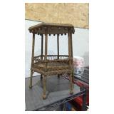 Antique wicker plant stand 17 in high 12 in wide
