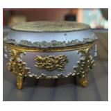 Adorable metal music box decorated with gold
