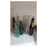 Various soda beer bottles from Cumberland Oakland