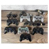 Group Of Playstation Video Game Controllers