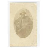 African American Man in Stickley Chair Postcard