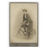 Victorian Woman Wood Rim Bicycle Cabinet Photo