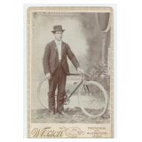Michigan Man with Bicycle Cabinet Photo