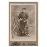 Wisconsin Lady with Bicycle Cabinet Photo