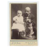 Man with Child and Pug Dog Cabinet Photo