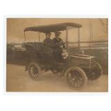 Couple Driving Model T Touring Car Photo