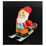 Tin Litho Key Wind Up Santa Skier Toy