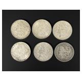 Group of 6 Morgan Silver Dollars