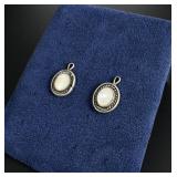 Pair of Navajo Sterling Mother of Pearl Pendants